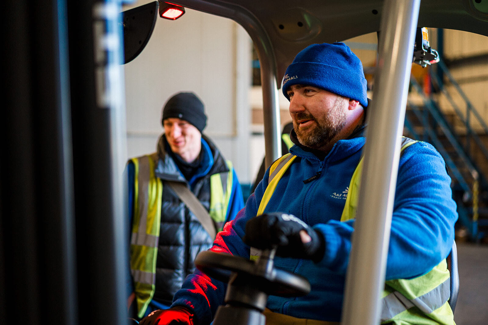 Forklift driving in warehouse